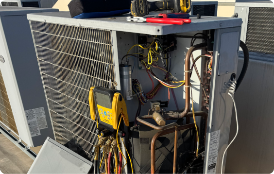 HVAC technician performing AC repair